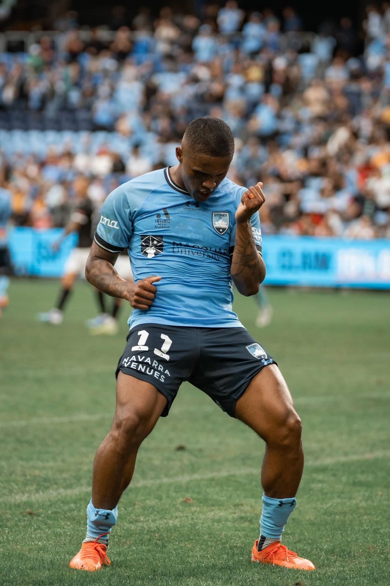 Player celebrating in front of the crowd