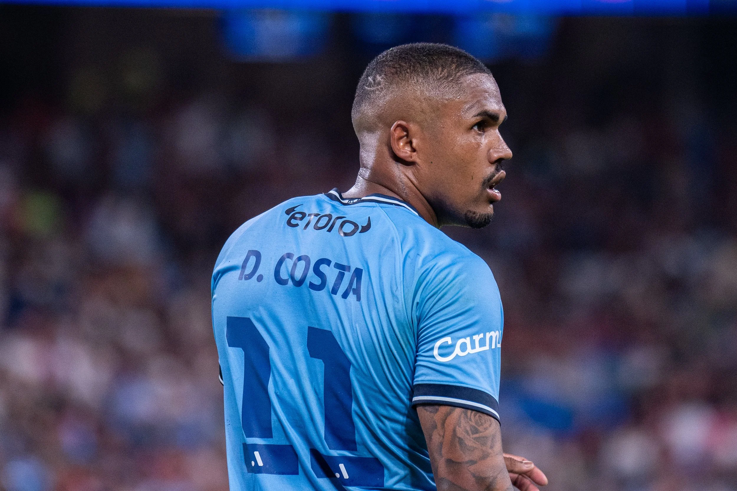 Player in light blue D. Costa jersey