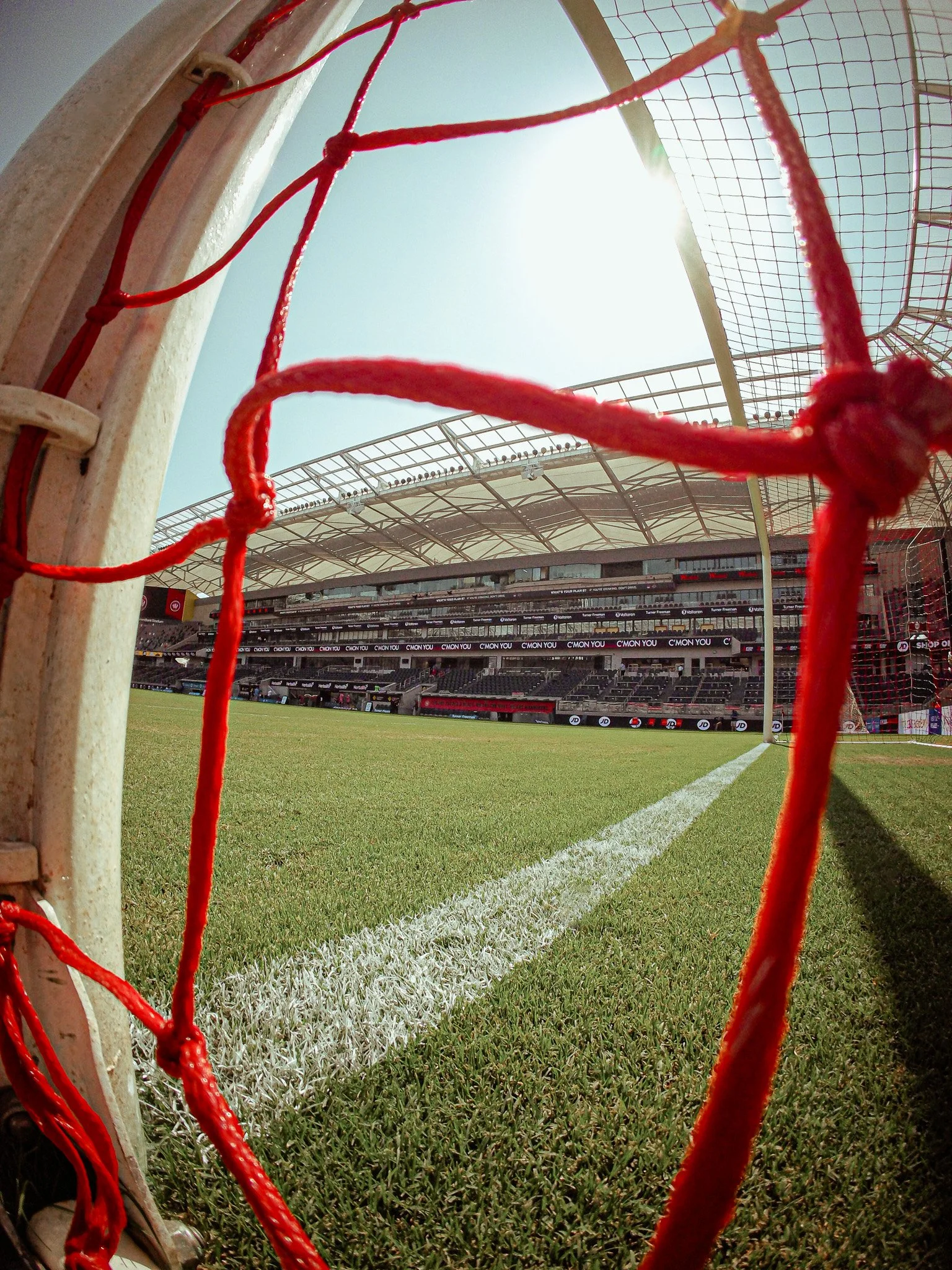 View from inside an empty stadium goal