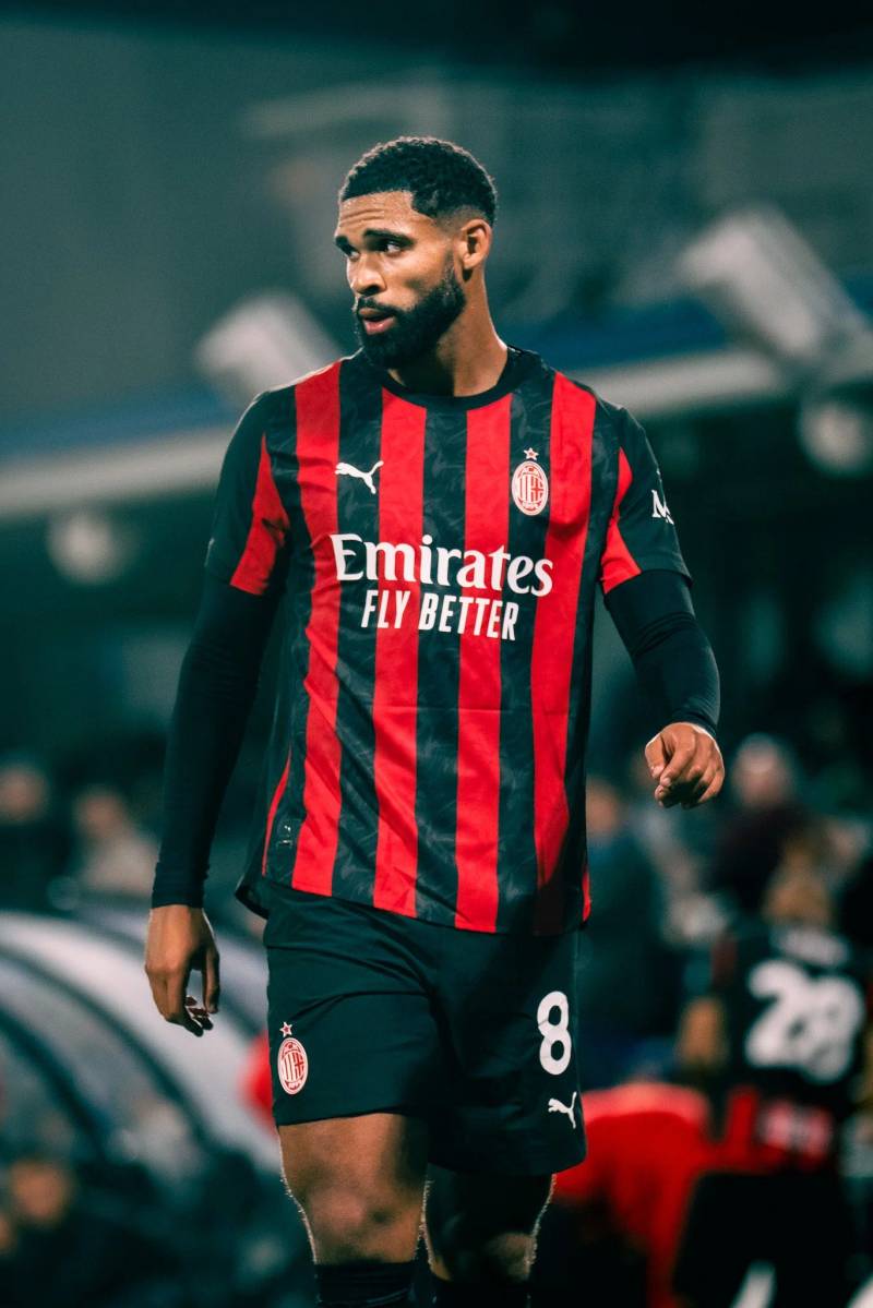 AC Milan player walking on the field