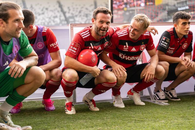 Players sitting on the sidelines