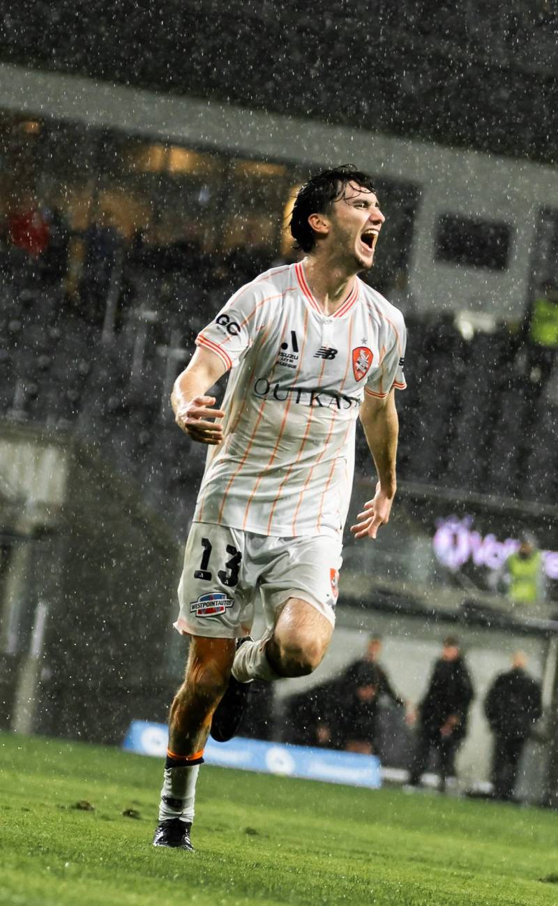 Player celebrating in the rain